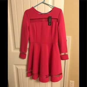 Medium pink cocktail dress with sleeves